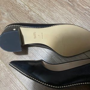 Black leather Coach shoes. Thick comfy heel. Only worn once